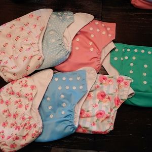 14 Nora's Nursery diapers and 14 total inserts
